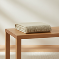Classic Merino Wool Throw - Sandstone folded on display table